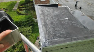 Removed damaged epdm perimeter flashing